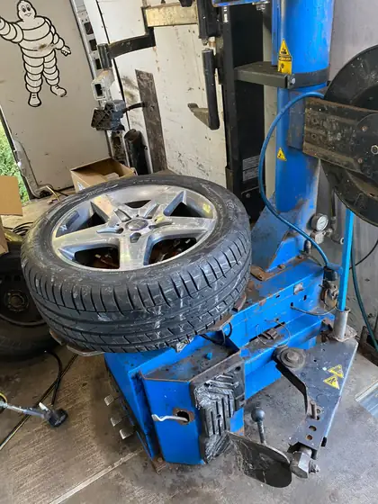 Tyre changing machine inside the mobile tyre fitting van