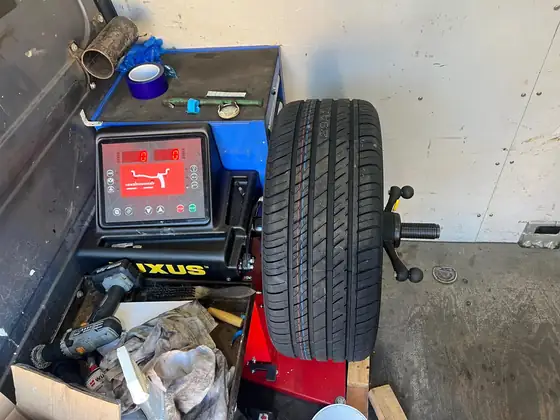 Wheel balancing machine inside the TyreGO mobile workshop van